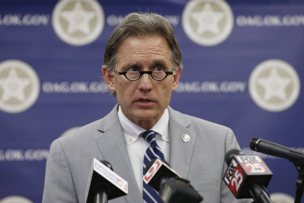 Oklahoma Attorney General Mike Hunter speaks during a news conference, Thursday, Sept. 12, 2019 ...