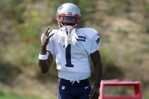 New England Patriots wide receiver Antonio Brown works out during an NFL football practice, Wed ...