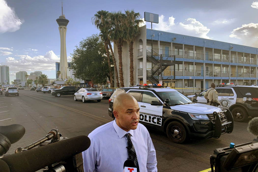 Lt. Ray Spencer of the Las Vegas Metropolitan Police Department Homicide Section, speaks to rep ...