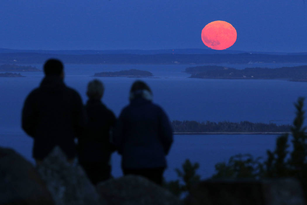 Jack and Kathy Duepree, of Camden, Maine, left and center, and their friend Betsy Starman, of N ...