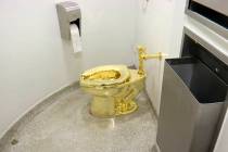 This Sept. 16, 2016 file image made from a video shows the 18-karat toilet, titled "America," b ...
