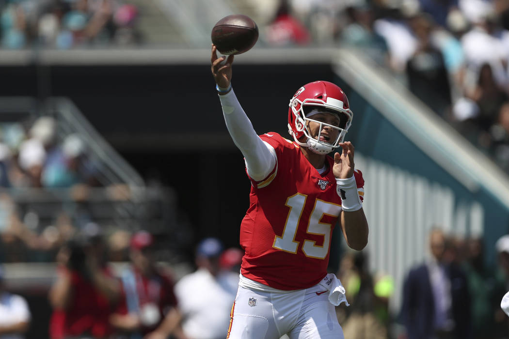 Kansas City Chiefs quarterback Patrick Mahomes (15) throws a pass during an NFL football game a ...