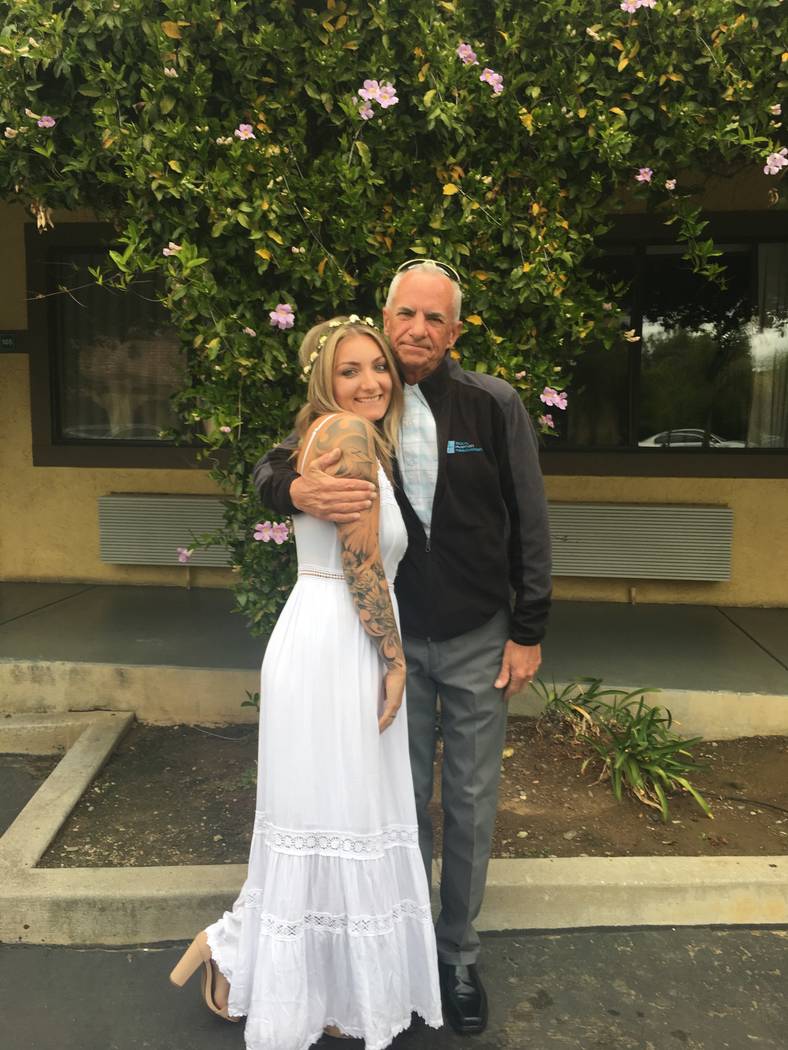 John McCarthy and his step-daughter, Katie Seelie, during Seelie's wedding in February 2019. Se ...