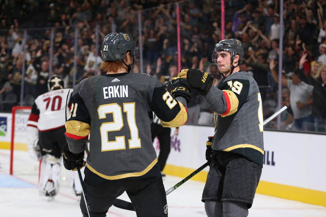 Vegas Golden Knights right wing Reilly Smith (19) celebrates his score with center Cody Eakin ( ...
