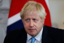 In a Sept. 5, 2019, file photo, British Prime Minister Boris Johnson takes his seat as he waits ...