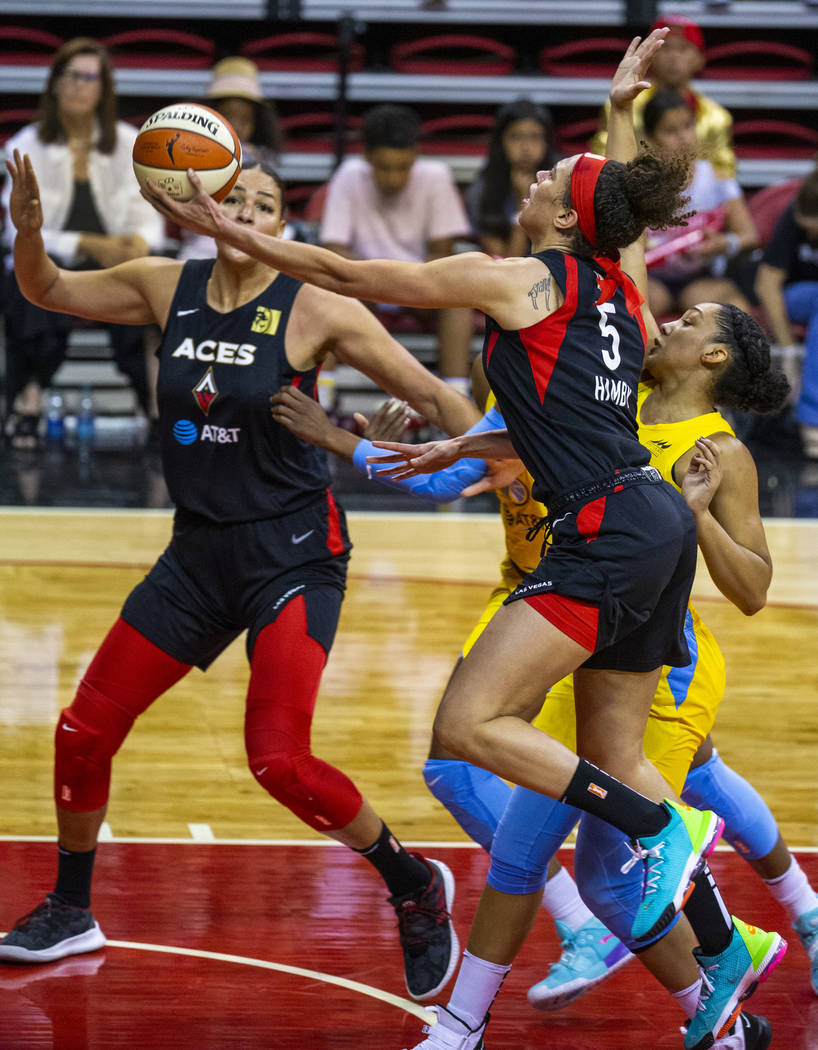 Las Vegas Aces forward Dearica Hamby (5) readies to lay the ball in over the Chicago Sky during ...