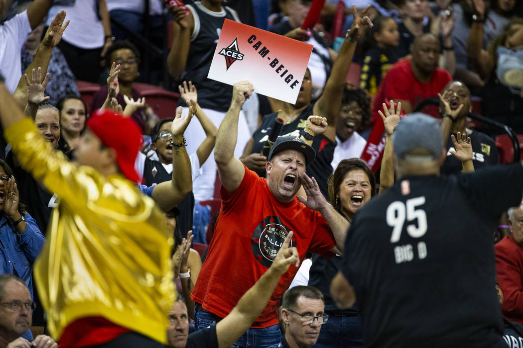 Las Vegas Aces fans cheer hard during a timeout versus the Chicago Sky in the second half of th ...
