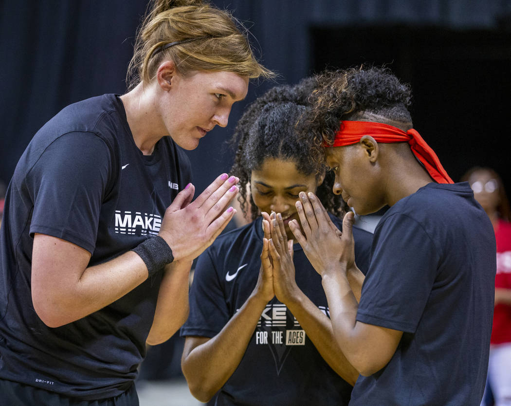 (From left) Las Vegas Aces center Carolyn Swords (4), Sydney Colson (51) and guard Sugar Rodger ...