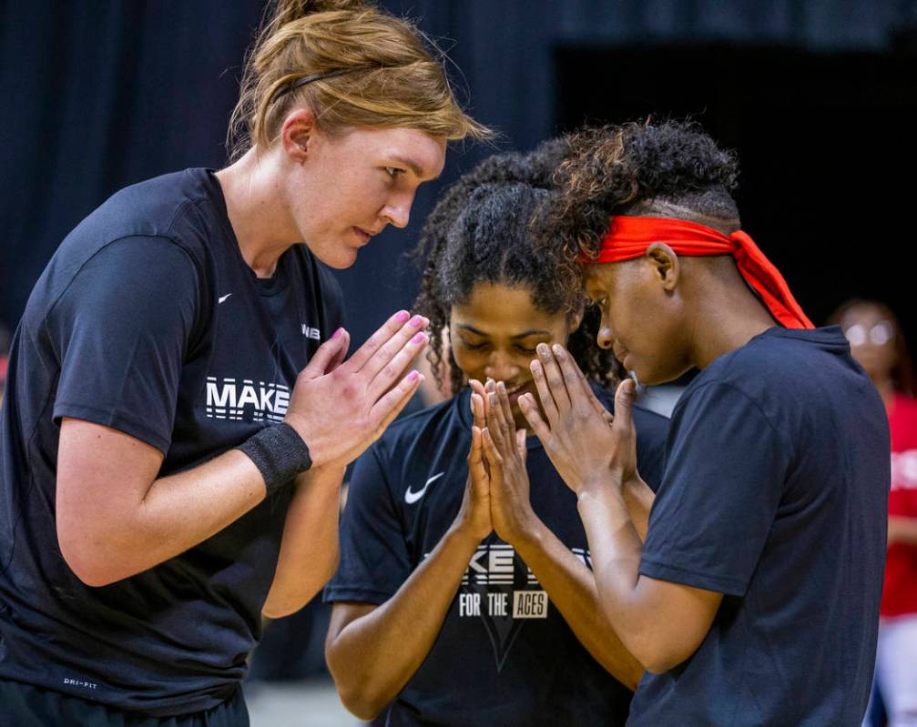 (From left) Las Vegas Aces center Carolyn Swords (4), Sydney Colson (51) and guard Sugar Rodger ...