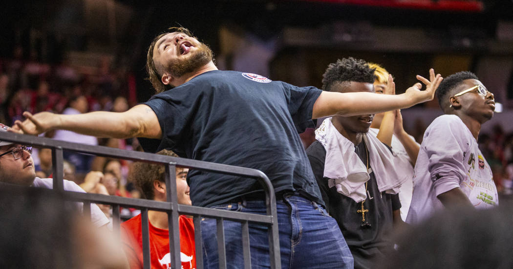 A Las Vegas Aces fan imitates the reaction of a Chicago Sky player in the second half of their ...
