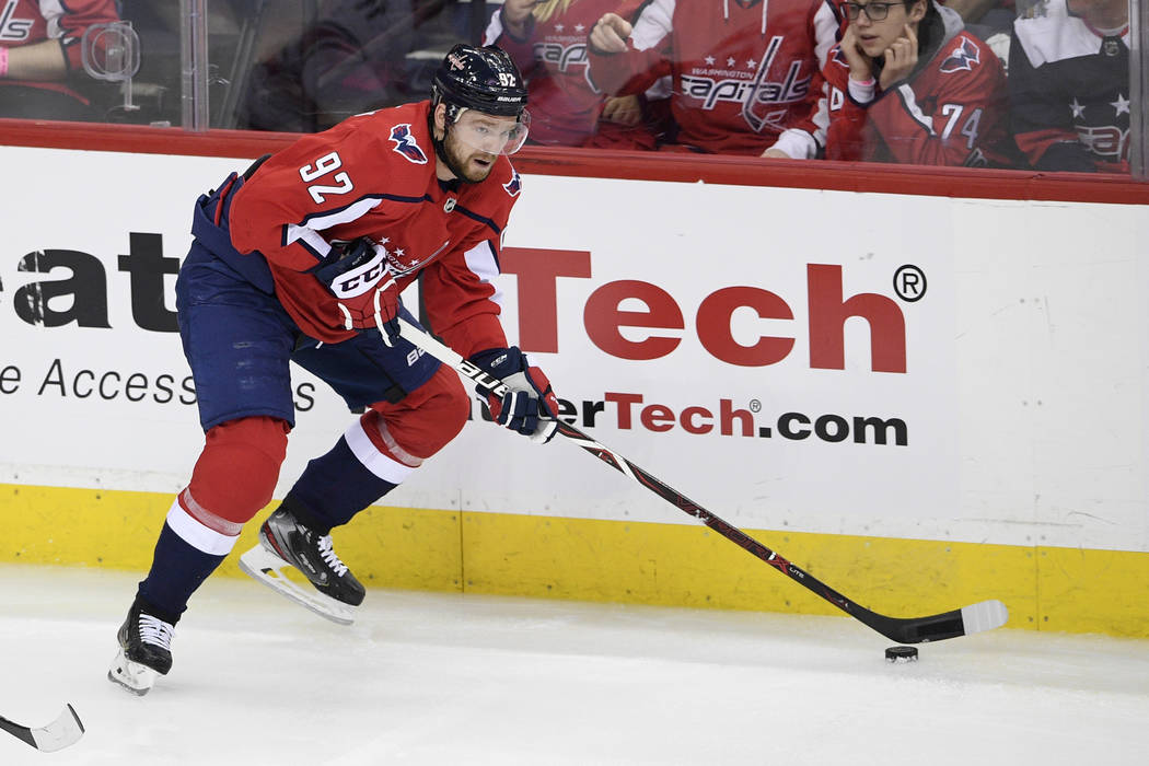 Washington Capitals center Evgeny Kuznetsov (92), of Russia, skates with the puck during the th ...