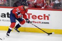 Washington Capitals center Evgeny Kuznetsov (92), of Russia, skates with the puck during the th ...