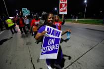 United Auto Workers members picket outside the General Motors Detroit-Hamtramck assembly plant ...