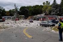 A police officer stands guard, Monday, Sept. 16, 2019, at the scene of a deadly propane explosi ...