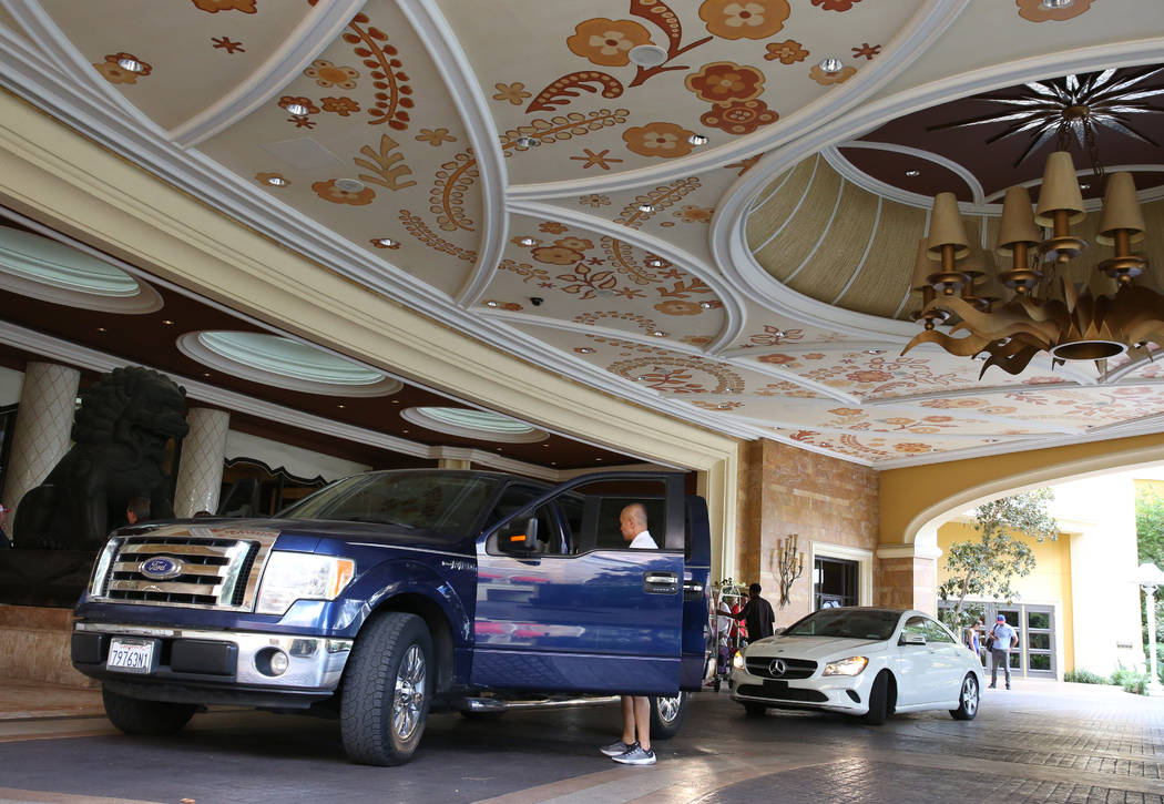 Valet drivers prepare to park gusts' cars at Wynn Las Vegas valet parking drop-off area on Mond ...