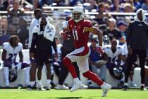 Arizona Cardinals wide receiver Larry Fitzgerald rushes the ball in the second half of an NFL f ...