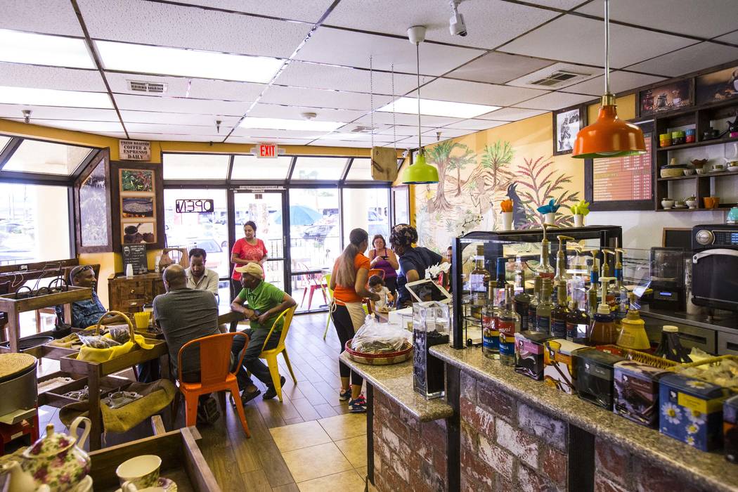 People enjoy drinks and food at Java Tree at Flamingo Road and Decatur Boulevard in Las Vegas o ...