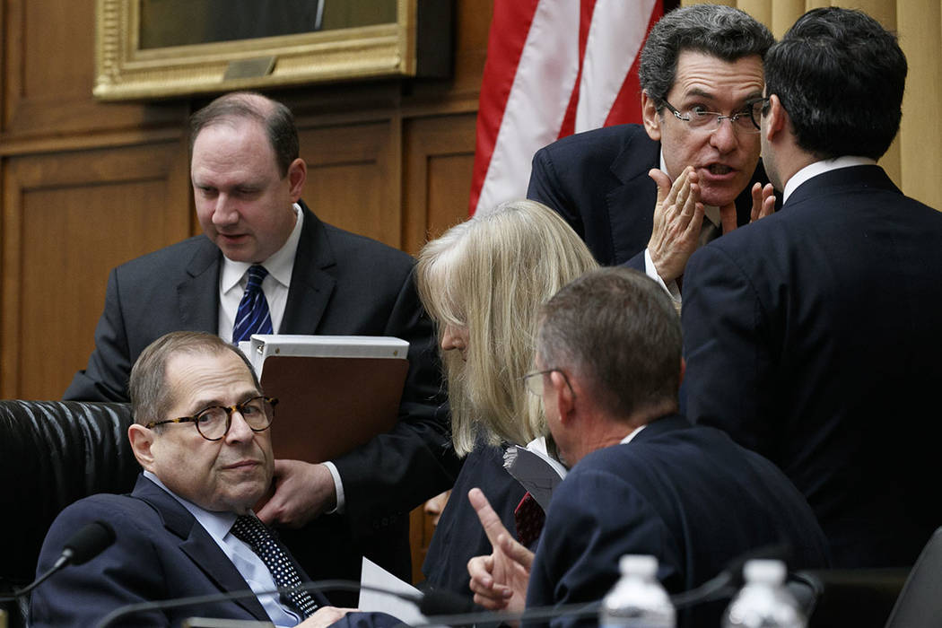 House Judiciary Committee chairman Rep. Jerrold Nadler of N.Y., left, is surrounded by staffers ...