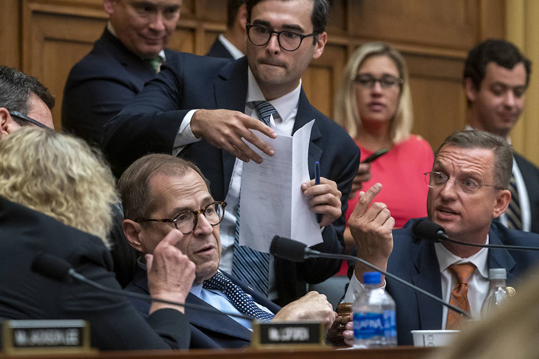House Judiciary Committee Chairman Jerrold Nadler, D-N.Y., left, listens to Rep. Doug Collins, ...