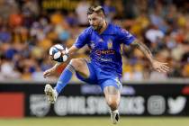 Tigres' Andre-Pierre Gignac jumps to bring down the ball during the second half of a UANL Leagu ...