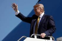 President Donald Trump arrives at Moffett Federal Airfield to attend a fundraiser, Tuesday, Sep ...