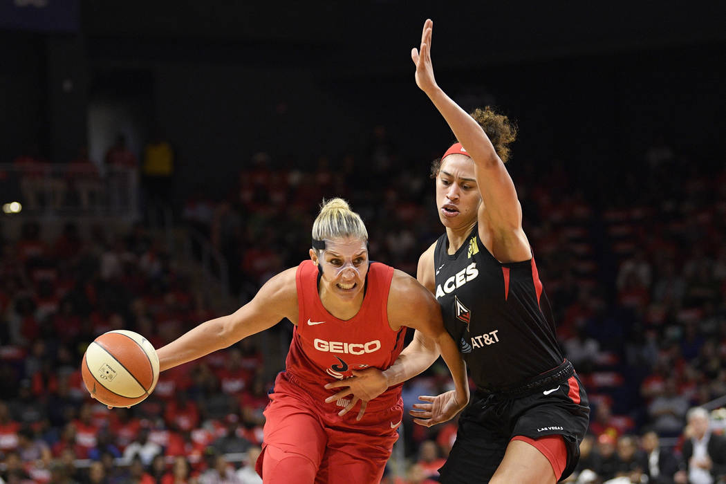 Washington Mystics forward Elena Delle Donne, left, drives to the basket against Las Vegas Aces ...