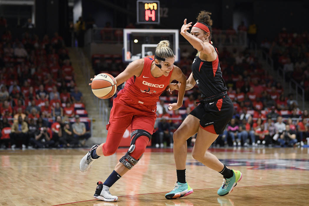 Washington Mystics forward Elena Delle Donne, left, drives to the basket against Las Vegas Aces ...