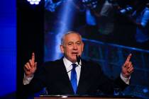 Israeli Prime Minister Benjamin Netanyahu addressees his supporters at party headquarters after ...