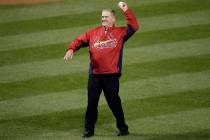 Formal St. Louis Cardinals manager Whitey Herzog throws out the ceremonial first pitch before G ...