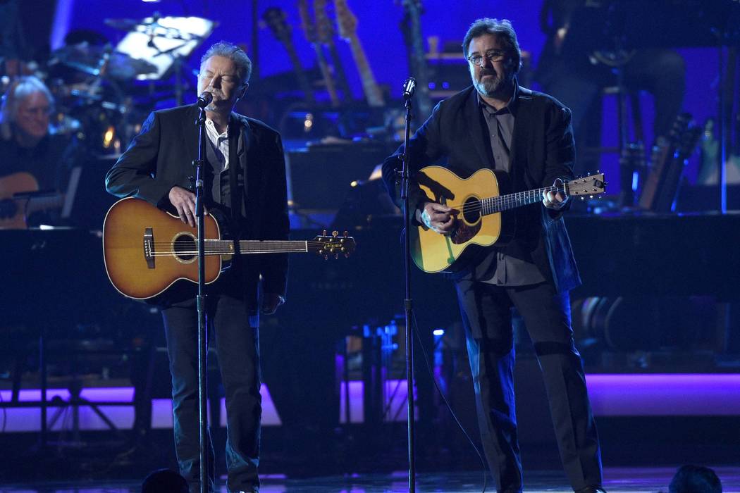 Don Henley, left, and Vince Gill perform "Eagle When She Flies" at MusiCares Person of the Year ...