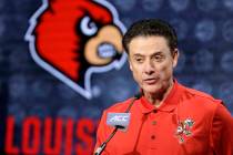 Then-Louisville NCAA college basketball head coach Rick Pitino answers a question during the At ...