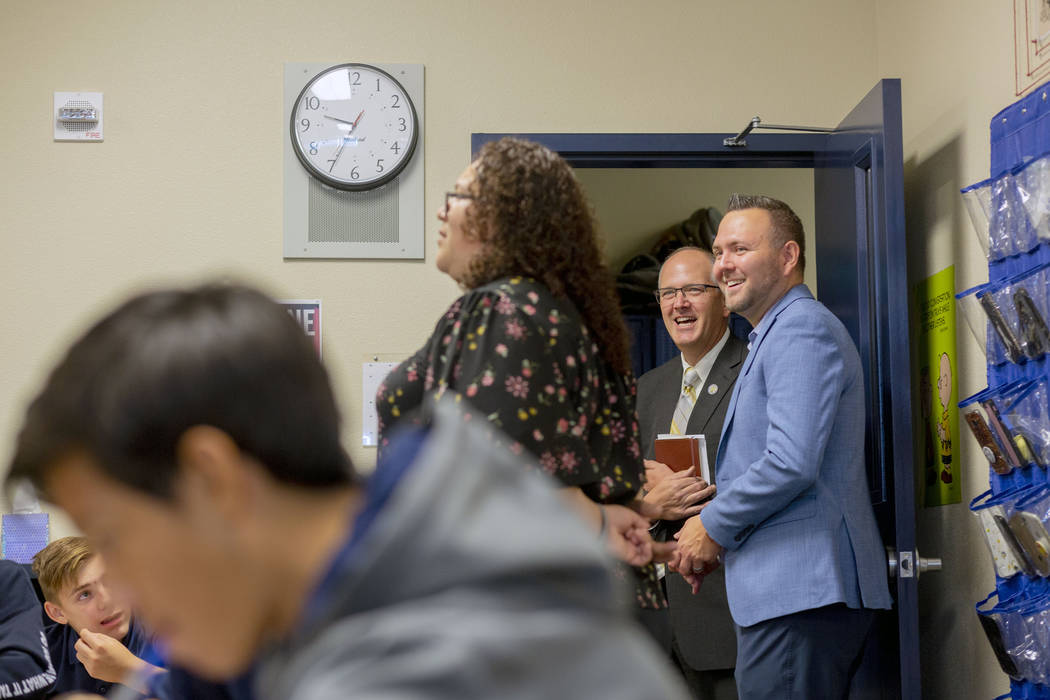 Spanish teacher Carolina Apodaca, left, Assistant U.S. Secretary of Education Scott Stump, cent ...