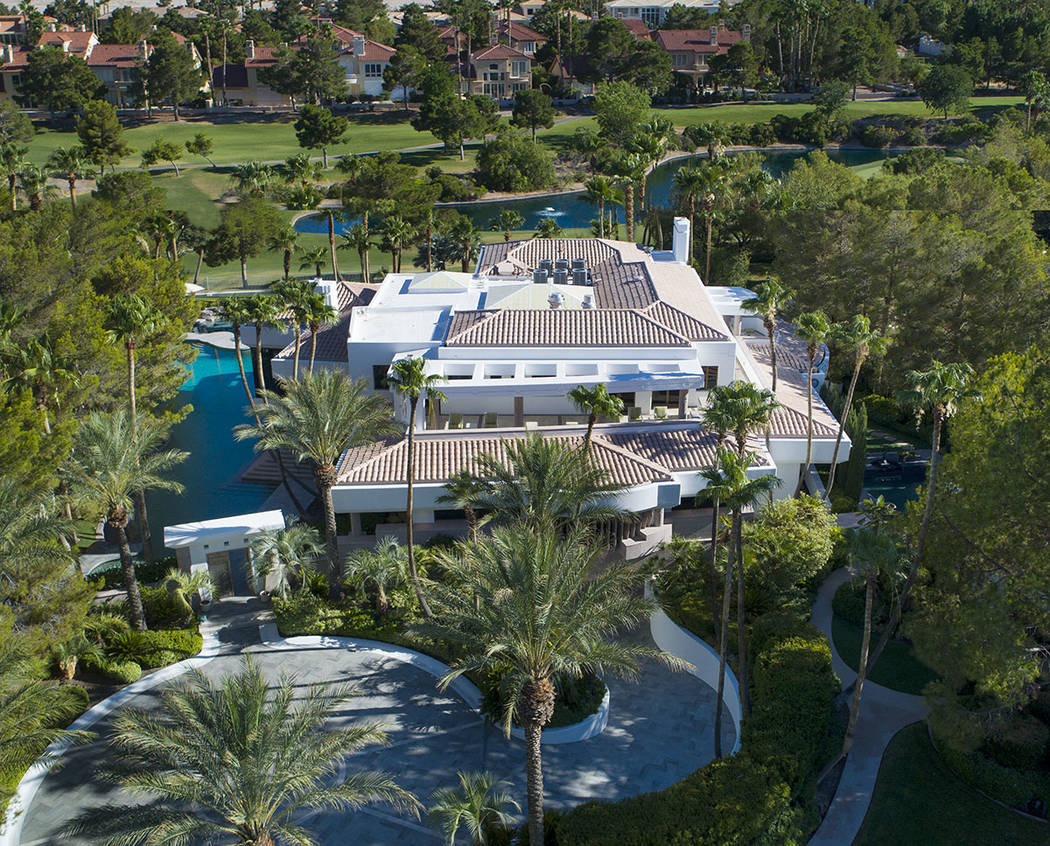The home is on the golf course. (Synergy Sotheby’s International Realty)