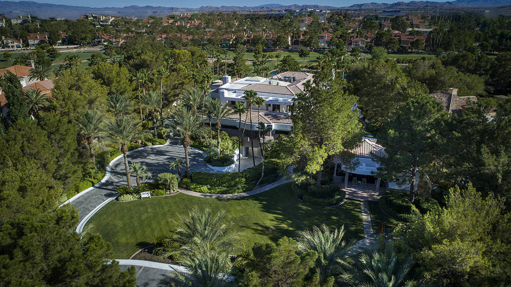 This 20,000-square-foot Spanish Trail Country Club home is listed for $18.5 million. (Synergy S ...