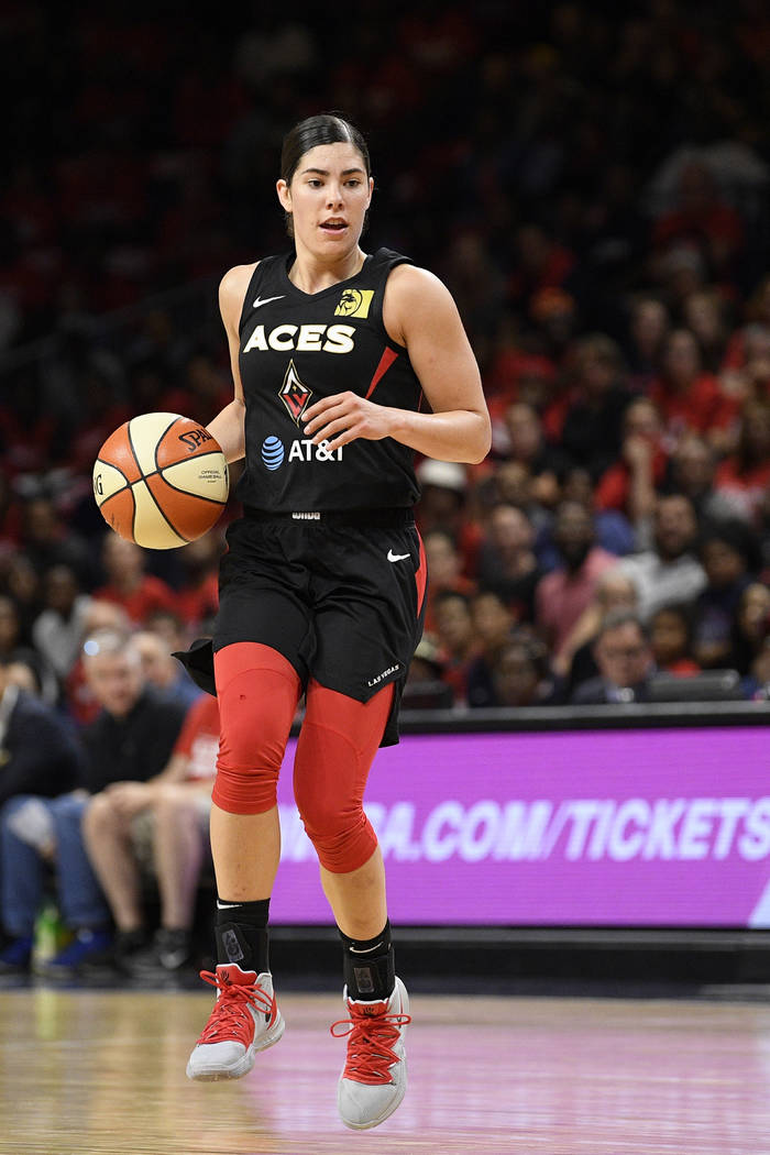 Las Vegas Aces guard Kelsey Plum dribbles the ball against the Washington Mystics during the se ...