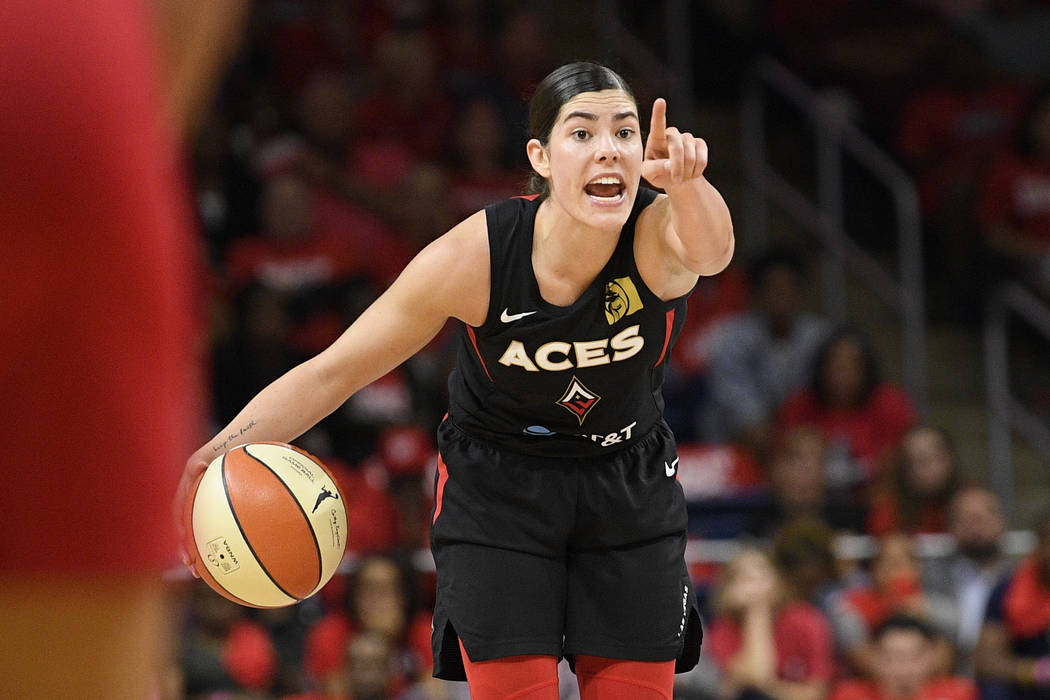 Las Vegas Aces guard Kelsey Plum dribbles the ball against the Washington Mystics during the se ...