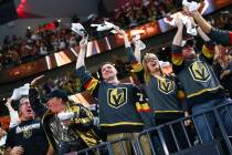 Golden Knights fans celebrate a goal by Golden Knights center Jonathan Marchessault, not pictur ...