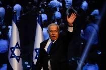 Israeli Prime Minister Benjamin Netanyahu addressees his supporters at party headquarters after ...