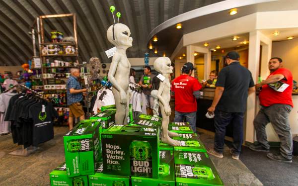 Customers line up for merchandise in the Alien Research Center which is the home of the Area 5 ...