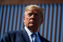 President Donald Trump tours a section of the southern border wall, Wednesday, Sept. 18, 2019, ...
