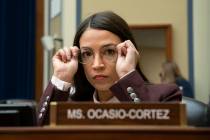 Rep. Alexandria Ocasio-Cortez, D-N.Y., attends a House Oversight Committee hearing on high pres ...