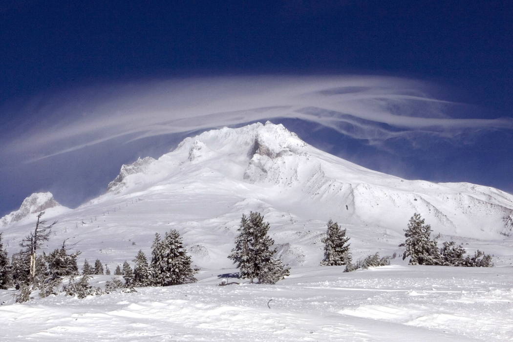 A cloud forms over Mount Hood as seen from Government Camp, Ore. (AP Photo/Don Ryan, File)