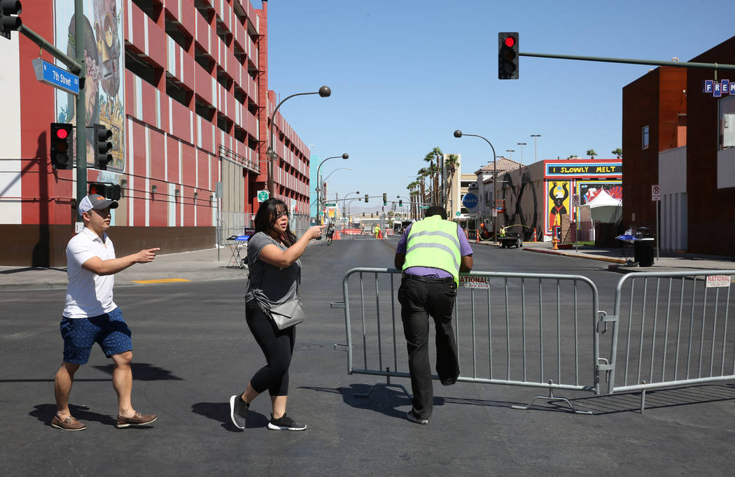 Pedestrians take alternate side street after finding out that Fremont Street is closed for pede ...