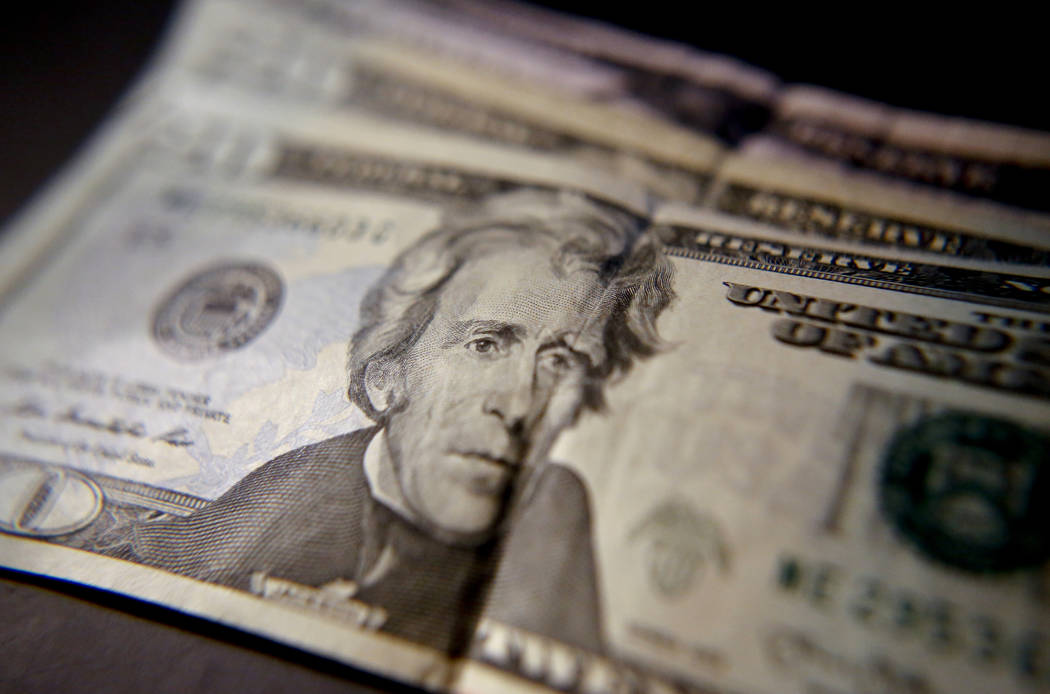 United States currency (AP Photo/Keith Srakocic)