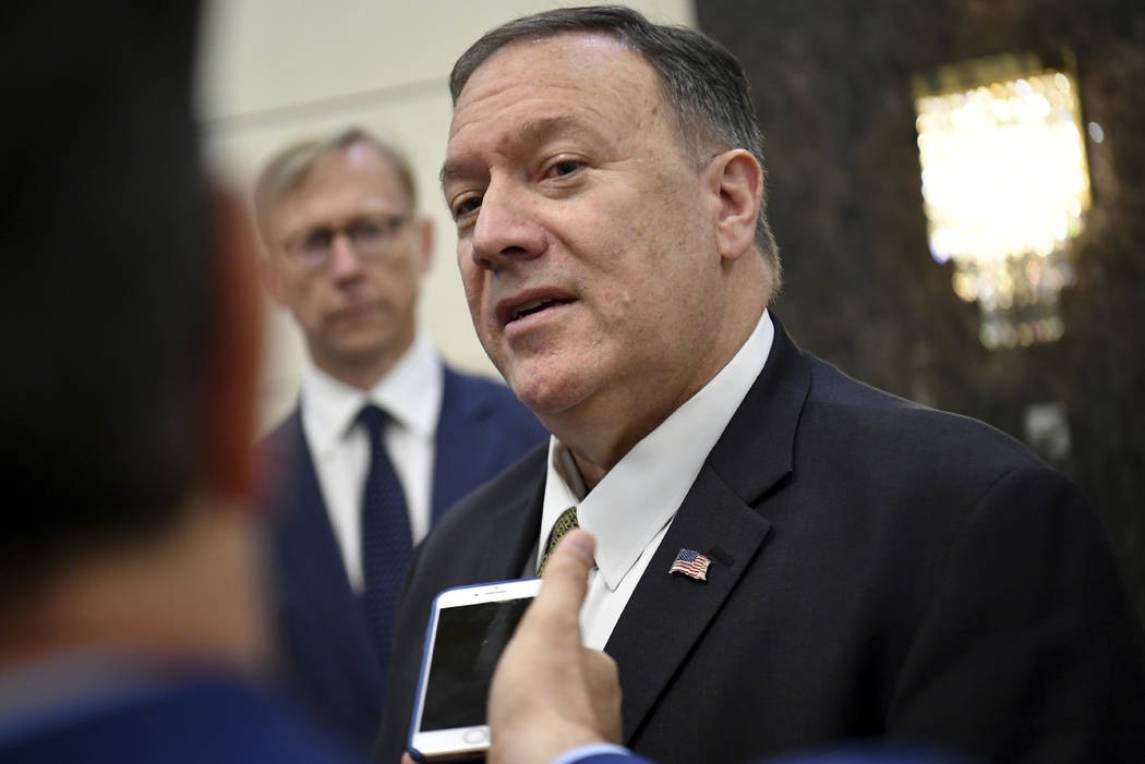 U.S. Secretary of State Mike Pompeo speaks to the media before departing from al-Bateen Air Bas ...