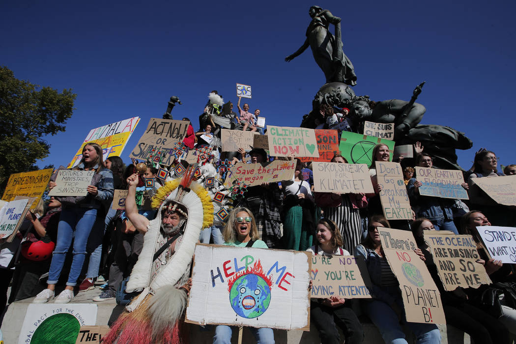 Youths gather at Nation square at the start of a climate demonstration Friday, Sept. 20, 2019 i ...