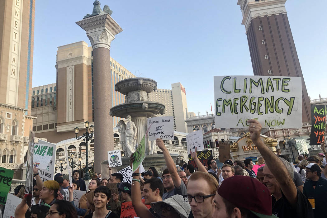 More than 100 people protest Friday, Sept. 20, 2019, outside The Venetian in Las Vegas as part ...