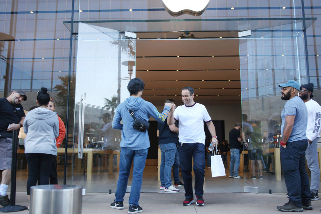 Staff at the Apple Store in downtown Summerlin alert customers