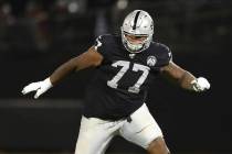 Oakland Raiders offensive tackle Trent Brown (77) protects a gap in the offensive line during a ...