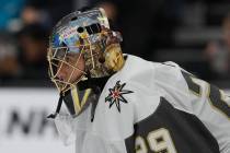 Vegas Golden Knights goaltender Marc-Andre Fleury watches action while defending his net during ...